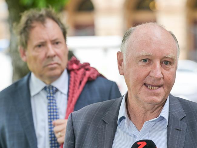 ADELAIDE, AUSTRALIA - NewsWire Photos NOVEMBER 9, 2022: Former Renewal SA boss John Hanlon, right, outside the District Court with his barrister David Edwardson KC after the DPP withdrew all charges against him. Picture: NCA NewsWire / Brenton Edwards