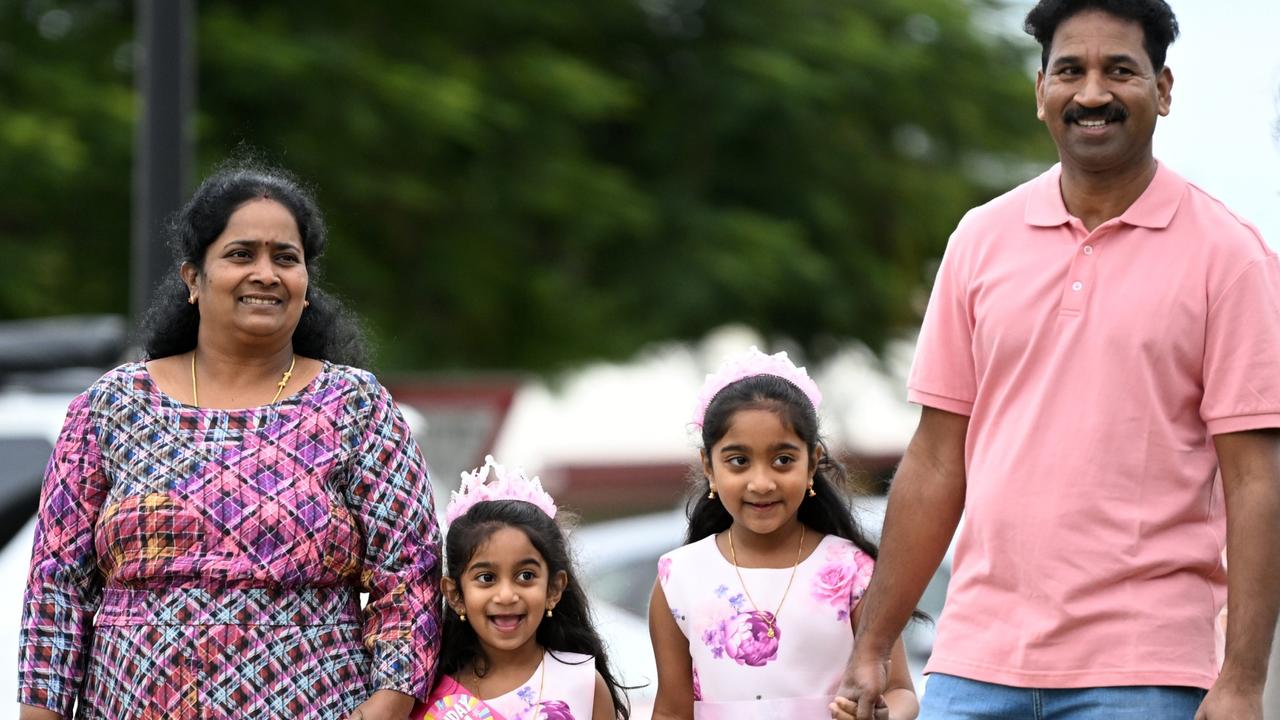 Tharni (second left) arrives for her 5th birthday party with her parents Priya and Nades and sister Kopika on June 12, in Biloela – her first ever birthday spent out of detention. Picture: Dan Peled/Getty Images