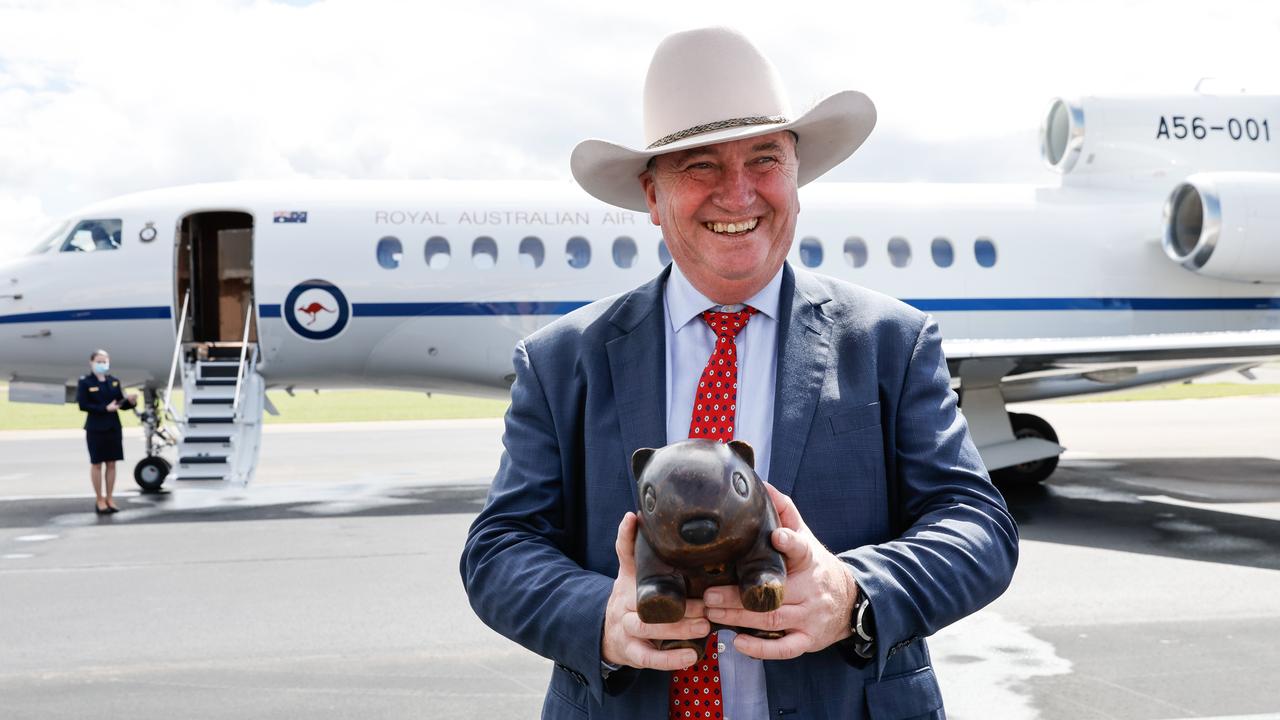 Day 4 of election campaign: Joyce with a ‘wombat’ at Williamstown Airport on April 14.