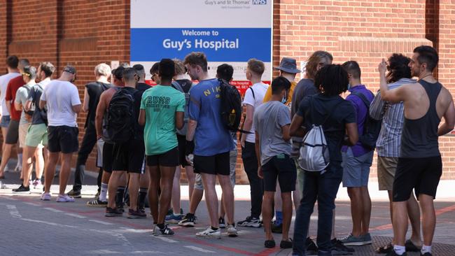 People line up to recieve vaccinations at Guy’s Hospital in London.