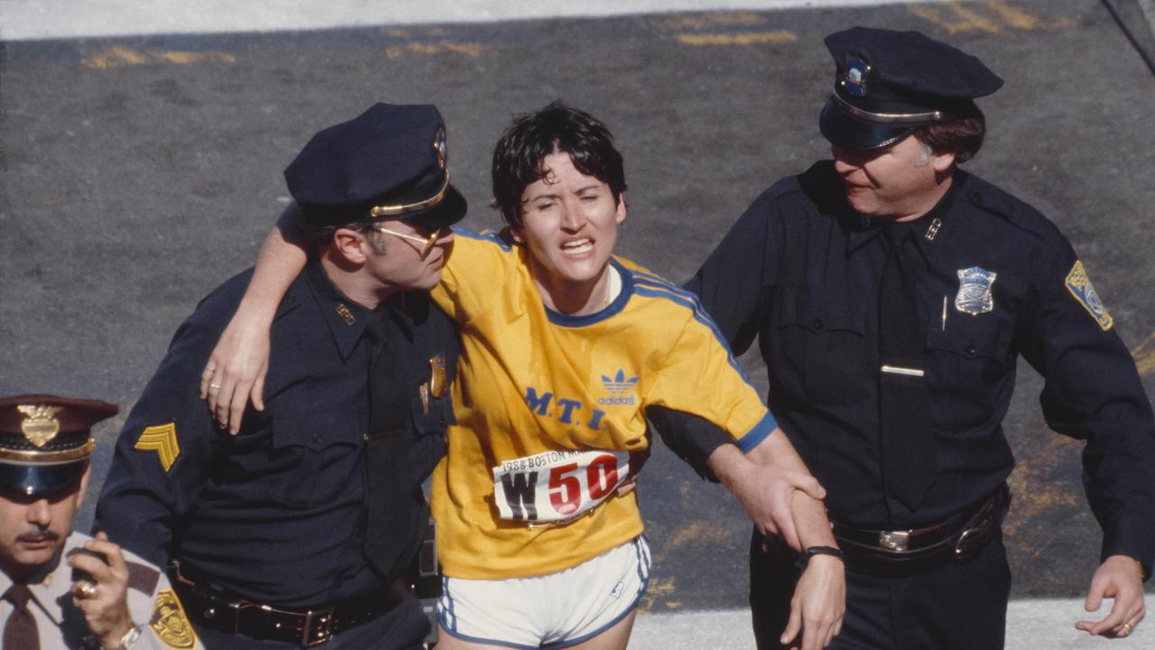 Rosie Ruiz is shown moments after crossing the finish line as the apparent women's race winner of the 84th Boston Marathon.