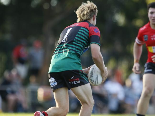 Jesse Poulsen has a run for the Colts. Picture Warren Gannon Photography