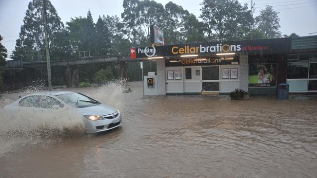 Bridge over Petrie Creek at Currie Street goes under January 2011. Photo: Brett Wortman / Sunshine Coast Daily