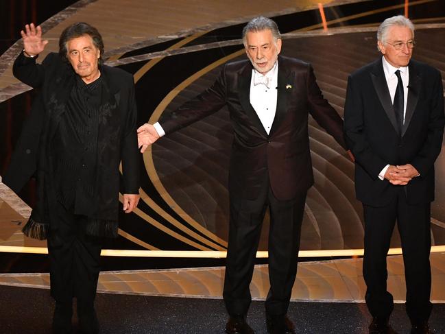 The Godfather, reunited! Al Pacino, director Francis Ford Coppola and Robert De Niro had a mini-Godfather reunion at the Oscars. Picture: AFP