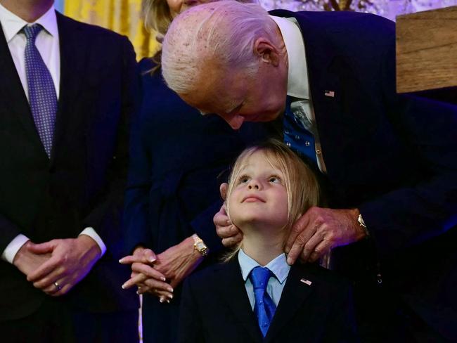 Mr Biden with his grandson Beau Biden during a Hanukkah holiday reception in the East Room of the White House. Picture: Jim Watson / AFP