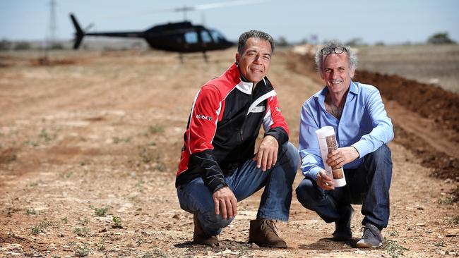 Sam Shahin and Fédération Internationale de Motocyclisme safety officer Franco Uncini at the start/finish line of the motorsport racetrack under construction at Tailem Bend. Picture: Mike Burton