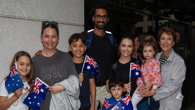 Thousands of people have braved the rain to gather in Brisbane for Anzac Day services. Picture: Grace Kessels
