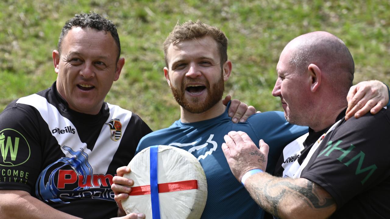 Matt Crolla, centre, won the first men's downhill Cooper's Hill Cheese race on May 29 in Gloucester, United Kingdom. Picture: Annabel Lee-Ellis/Getty Images