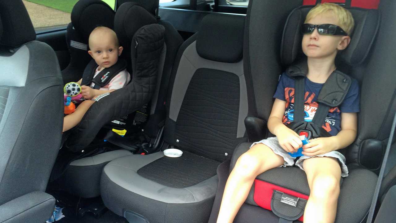 Children should remain in booster seats until they're at least 145 centimetres. Picture: Iain Curry