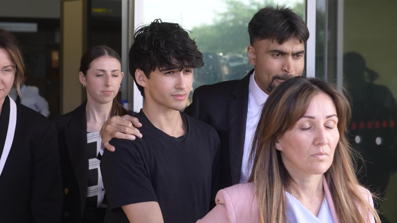 Dhirren Randhawa leaves Christies Beach Magistrates Court with his mother Amreeta Stara in front. Picture: NCA NewsWire / Roy VanDerVegt