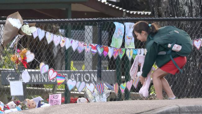 Tributes have been left at Russell Island State School. Picture: Steve Pohlner