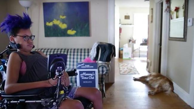 Jerika Bolen uses a motorised wheelchair to get around. Picture: YouTube/USA Today