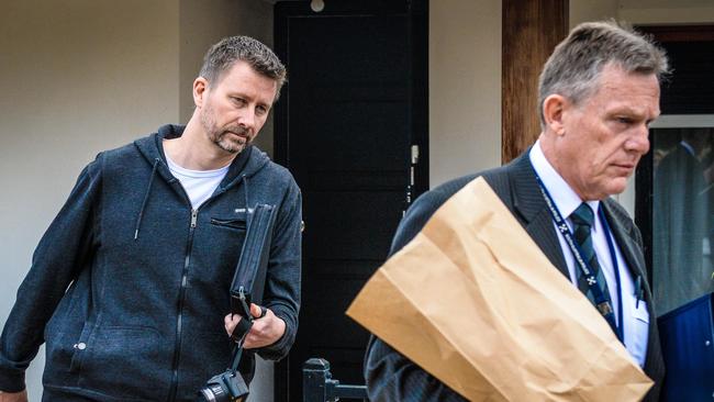 Detectives at an Andrews Farm property during the investigation into the murder of Mark Boyce in 2017. Picture: AAP / Roy Vandervegt