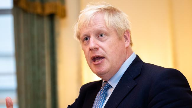 British Prime Minister Boris Johnson hosts various members of the armed services at a military reception at 10 Downing Street. Picture: Getty