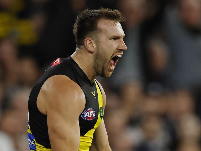 MELBOURNE , AUSTRALIA. March 14 , 2024.  AFLÃ Round 1. Carlton vs Richmond at the MCG.   Richmonds Noah Balta celebrates a 1st quarter goal  . Pic: Michael Klein