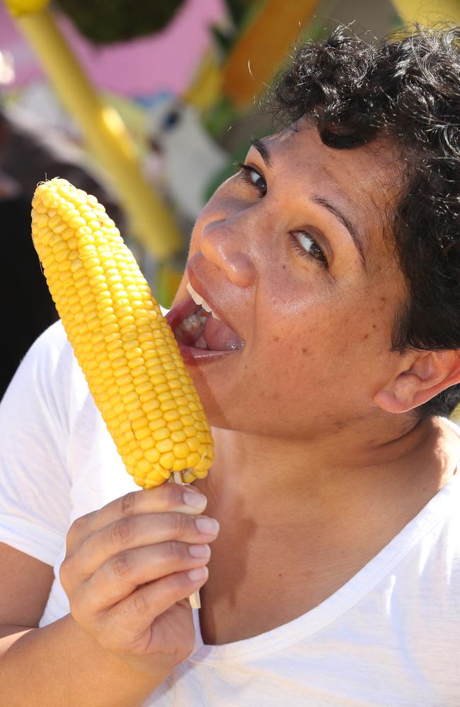 Huge crowds for the first day of the Gold Coast Show. Mariata Takuira enjoys some corn. Picture: Glenn Hampson