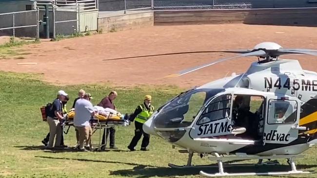 Salman Rushdie is seen being loaded onto a medical evacuation helicopter near the Chautauqua Institution. Picture: Horatio Gates/AFP