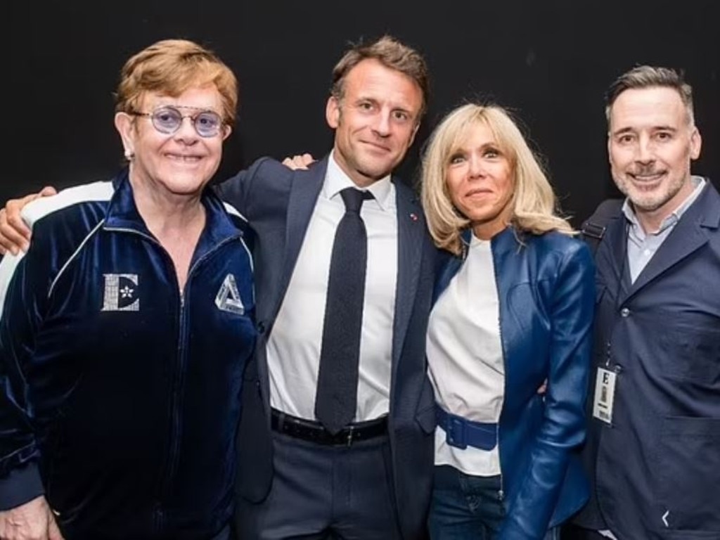 David Furnish posted this picture to Instagram of Emmanuel Macron and his wife Brigitte backstage with Elton John.