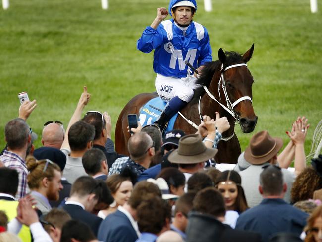 Hugh Bowman and Winx win the Cox Plate on Saturday but spring carnival crowds have been on the decline. Picture: Colleen Petch