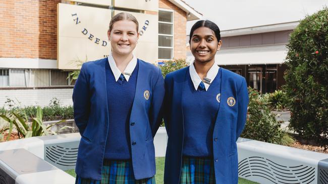 Nagle College captains Isabelle Grills and Angeline Rajadurai.