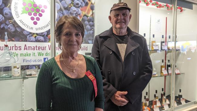 Val Lloyd, Ipswich, and Alan Brown, Bellbird Park, at the Ipswich Show after winning awards for their respective bottles of wine. Picture: Ebony Graveur