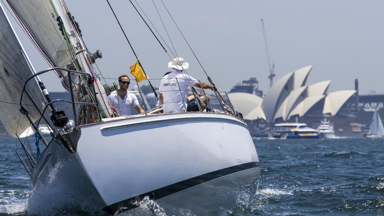 What a shot. Fidelis and her crew enjoying the racing - and scenery.