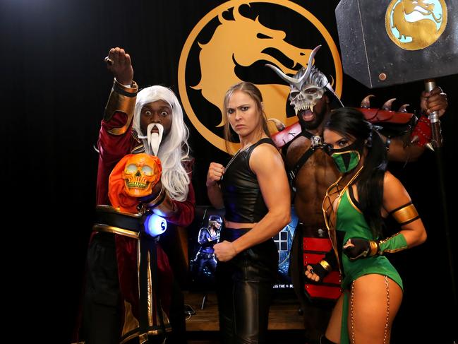 Ronda Rousey (second from left) was the highest paid competitor in the UFC because the fans loved her. Picture: Tasia Wells/Getty Images for Warner Bros Interactive Entertainment