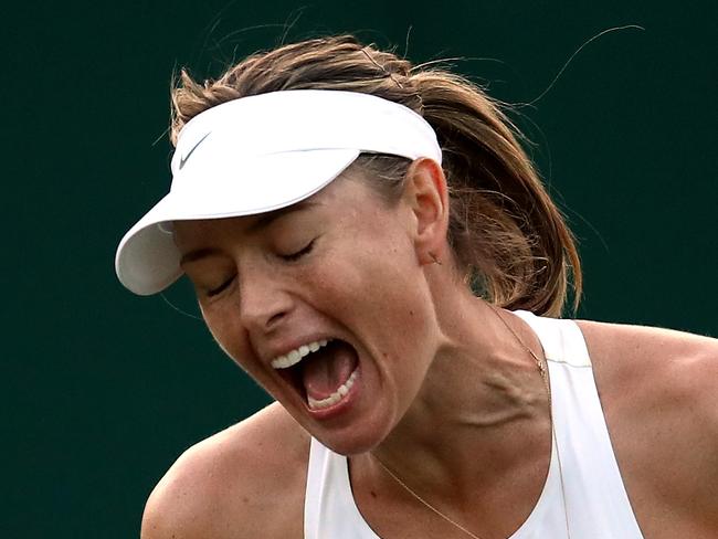 LONDON, ENGLAND - JULY 03:  Maria Sharapova of Russia shows her frustration during her Ladies' Singles first round match against Vitalia Diatchenko of Russia on day two of the Wimbledon Lawn Tennis Championships at All England Lawn Tennis and Croquet Club on July 3, 2018 in London, England.  (Photo by Clive Brunskill/Getty Images)