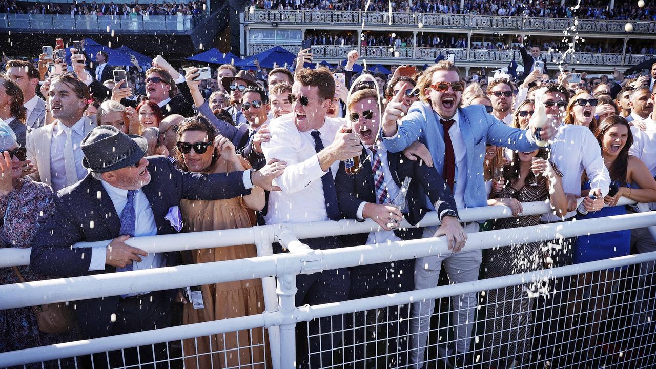 Things get a little rowdy in the members’ stand as Giga Kick wins the $15M race at Royal Randwick on Everest Day. Picture: Sam Ruttyn