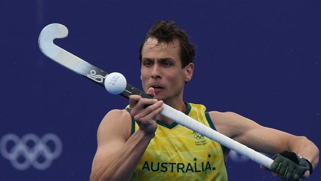 Australia's forward #02 Thomas Craig controls the ball in the men's pool B field hockey match between Australia and Argentina during the Paris 2024 Olympic Games at the Yves-du-Manoir Stadium in Colombes on July 27, 2024. (Photo by Ahmad GHARABLI / AFP)