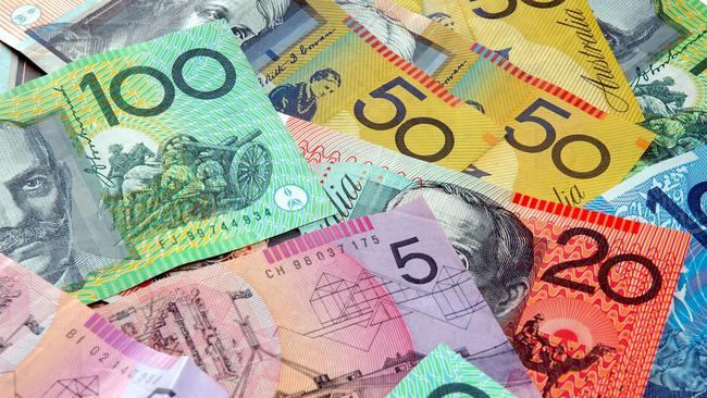 Australian notes scattered on a table. Notes, currency, generic money