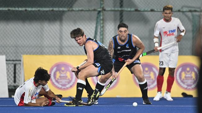 Territory Stingers men playing Tenaga Nasional Berhad in the MHL 2025. Picture: Muhd Haziq
