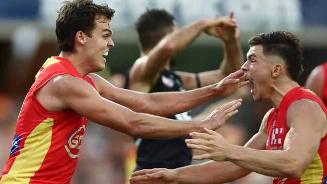 Jack Bowes celebrates his late matchwinner for Gold Coast. Picture: Chris Hyde/Getty Images.