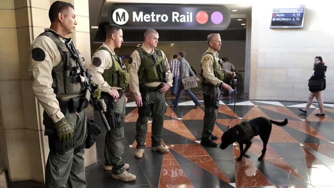 Cities around the world, such as Los Angeles, have ramped up visible security at railway stations and airports. Picture: AP Photo/Nick Ut.