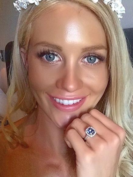 Ali shows off the ring on an Instagram post. 