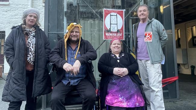 From left, protest organiser Kate Kelly, disability advocate Ana Pike, artist Jon Kudelka and Disability Voices Tasmania director Michael Smalls at the ribbon un-cutting ceremony for the Salamanca Arts Centre lift.