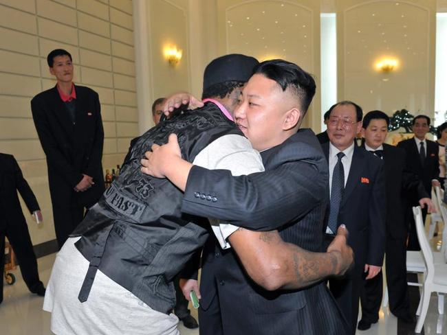 North Korean leader Kim Jong-un hugging former NBA player Dennis Rodman following a basketball game between the Harlem Globetrotters team and North Korean University of Physical Education players. Picture: KCNA