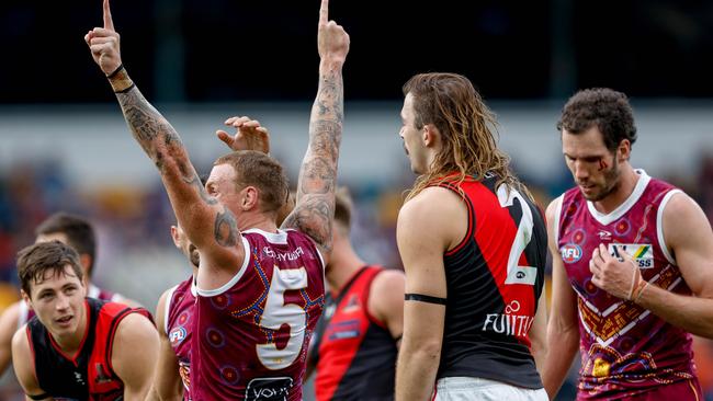 BRISBANE, AUSTRALIA - JULY 10: Mitch Robinson of the Lions celebrates a goal during the 2022 AFL Round 17 match between the Brisbane Lions and the Essendon Bombers at The Gabba on July 10, 2022 in Brisbane, Australia. (Photo by Russell Freeman/AFL Photos via Getty Images)