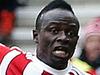 Southampton's Senegalese midfielder Sadio Mane (2L) scores his team's first goal past Liverpool's Belgian goalkeeper Simon Mignolet during the English Premier League football match between Southampton and Liverpool at St Mary's Stadium in Southampton, southern England on March 20, 2016. / AFP PHOTO / ADRIAN DENNIS / RESTRICTED TO EDITORIAL USE. No use with unauthorized audio, video, data, fixture lists, club/league logos or 'live' services. Online in-match use limited to 75 images, no video emulation. No use in betting, games or single club/league/player publications. /