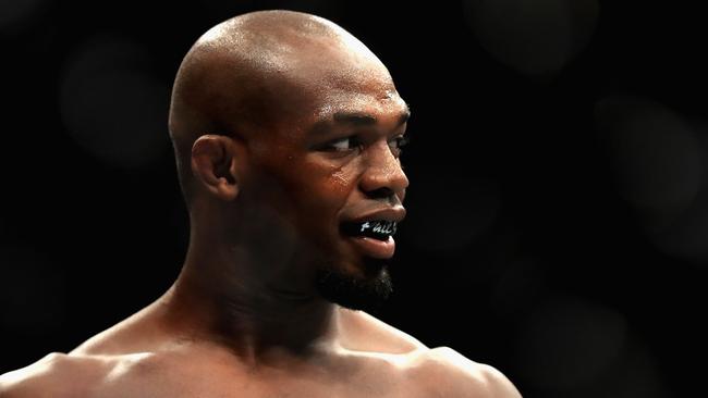 Jon Jones looks on prior to a fight against Daniel Cormier at UFC 214.