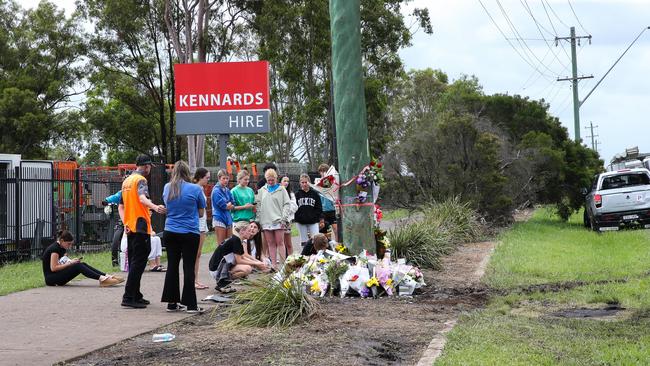 Friends and family gather at the site where two teens have died and one has been injured in a crash at McGraths Hill on Monday night. Picture: NCA NewsWire