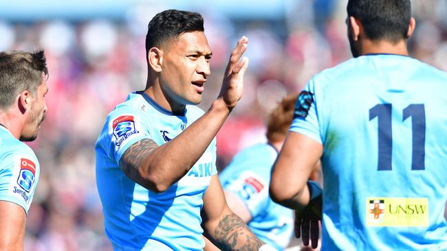 Waratahs fullback Israel Folau celebrates scoring against the Sunwolves on Saturday. Picture: Getty Images