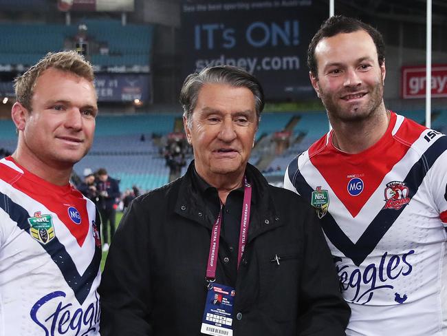 Jake Friend and Boyd Cordner with Nick Politis and the Sydney Roosters finish minor Premiers with the JJ Giltinan Shield during NRL match Sydney Roosters v Parramatta Eels at ANZ Stadium. Picture. Phil Hillyard