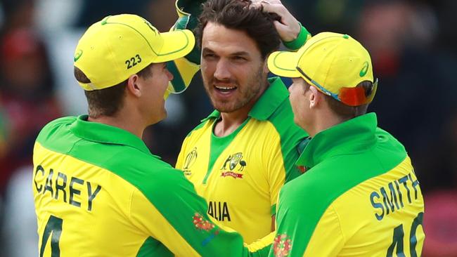 Coulter-Nile, Steve Smith and Alex Carey combined to take Australia to a competitive score.