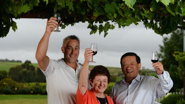 Onkaparinga Council chief executive Mark Dowd, Mayor Lorraine Rosenberg and Chinese magistrate Su Jingwen visiting as part of a Chinese delegation to McLaren Vale. Picture: Naomi Jellicoe