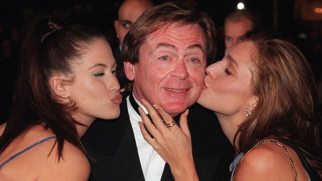 Nicola Charles and Tottie Goldsmith kiss Daniel Davis at the 1997 Logie Awards. Picture: Supplied