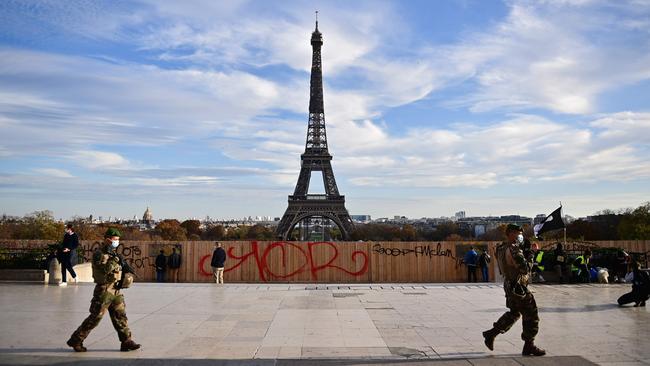 French soldiers of the Sentinelle patrol during a demonstration for the second anniversary of the "yellow vest" (gilets jaunes) movement at the Trocadero in Paris. Picture: AFP