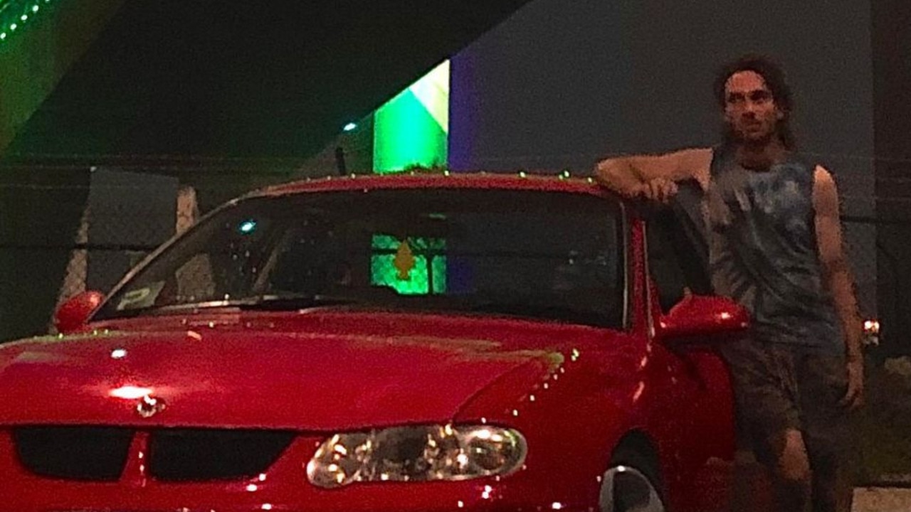 Jesse Hundhammer posing next to one of the cars shown in his TikTok videos. Picture: Facebook.