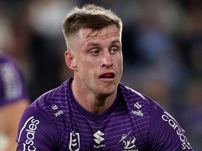 SYDNEY, AUSTRALIA - JULY 26: Cameron Munster of the Storm passes the ball to a team mate during the round 21 NRL match between Parramatta Eels and Melbourne Storm at CommBank Stadium, on July 26, 2024, in Sydney, Australia. (Photo by Brendon Thorne/Getty Images)