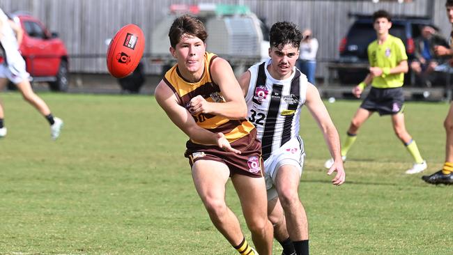Hamish McPherson hand balls during his team’s thrilling two point win. Picture, John Gass